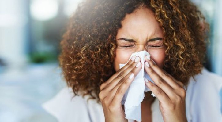 person using tissue